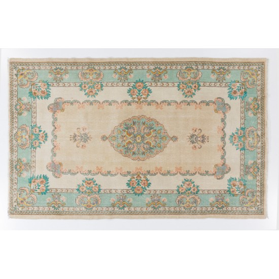 Vintage Hand-Knotted Anatolian Rug in Turquoise, Green, Pink and Sand Color. 5.9 x 9.5 Ft (178 x 288 cm)